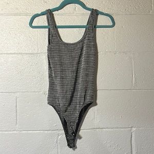 black and white body suit